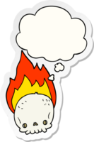 spooky cartoon flaming skull and thought bubble as a printed sticker png