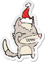 desenho de adesivo angustiado de lobo cansado de um chapéu de papai noel png