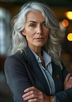 AI generated Business Woman middle aged, arms crossed, gray white hair, photo