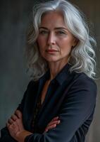 AI generated Business Woman middle aged, arms crossed, gray white hair, photo