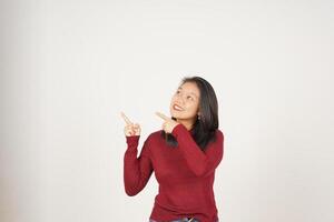 Young Asian woman in Red t-shirt pointing side copy space  isolated on white background photo