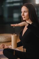 Woman playing to Koshi instrument. singing along, meditating music photo