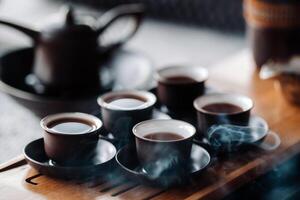 Preparing for a tea ceremony with a large company photo