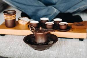 Preparing for a tea ceremony with a large company photo
