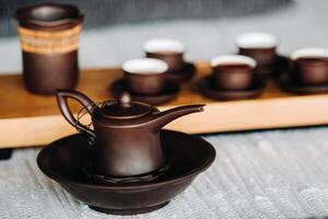 Preparing for a tea ceremony with a large company photo