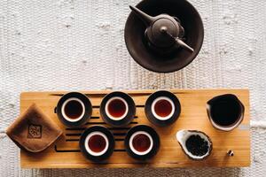 Preparing for a tea ceremony with a large company photo