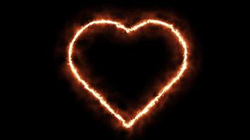 Fire heart shape on black background video