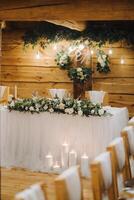 Beautiful table setting with floral decor for the holiday. Wedding decor photo