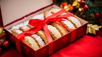 AI generated Christmas biscuits, holiday biscuit gift box and home bakes, winter holidays present for English country tea in the cottage, homemade shortbread and baking recipe photo