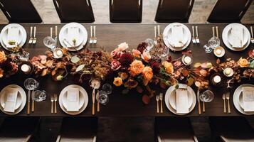 AI generated Autumn holiday tablescape, formal dinner table setting, table scape with elegant autumnal floral decor for wedding party and event decoration photo