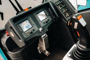 Crane control panel in the driver's cab of a car crane photo