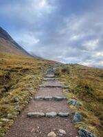 Hiking trail to the summit of the Ben Nevis Mountain. Fort William, Scotland. photo