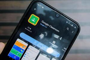 Google Classroom application on Smartphone screen. Classroom is a freeware web browser developed by Google LLC. Bekasi, Indonesia, February 28, 2024 photo