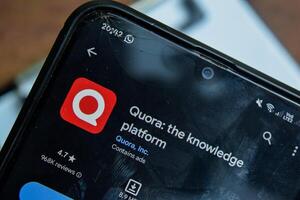 Quora - the knowledge platform application on Smartphone screen. Quora is a freeware web browser developed by Quora, Inc. Bekasi, Indonesia, February 21, 2024 photo