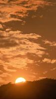 Timelapse of dramatic sunrise with orange sky in a sunny day. video