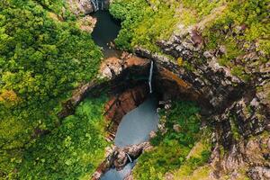 Aerial view from above of the Tamarin waterfall seven cascades in the tropical jungles of the island of Mauritius photo