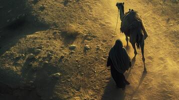 ai generado aéreo ver de un hombre viajero con su camello en el Desierto foto