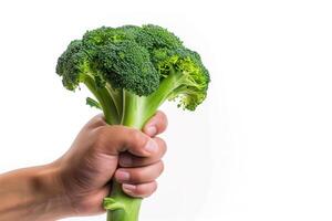 AI generated Fresh Broccoli in Hand, Health Concept photo