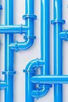 AI generated 3D illustration of a complex network of blue pipes on a white background, symbolizing infrastructure, plumbing systems, or industrial design concept photo
