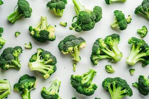 AI generated Fresh green broccoli florets scattered on a white background, ideal for healthy eating and vegetarian lifestyle concepts photo