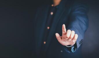 Professional man shaking hands with another person in a business deal, conveying success and agreement photo