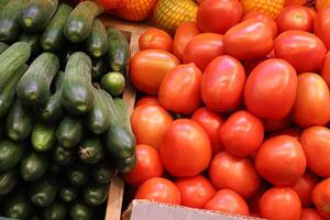 Vegetables, fruits and berries are sold at the bazaar in Tel Aviv photo