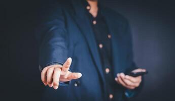 Professional man shaking hands with another person in a business deal, conveying success and agreement photo