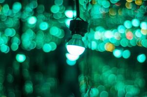 landscape photo of lightbulb with bokeh as background