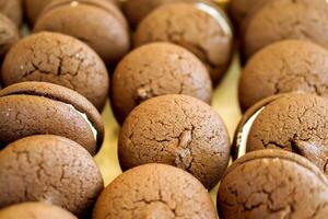 Closeup and crop Chocolate Sandwich Cookies in a bakery shop. photo