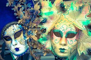 Souvenirs and carnival masks on street trading in Venice, Italy photo