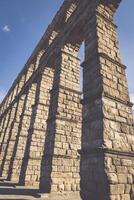 The famous ancient aqueduct in Segovia, Castilla y Leon, Spain photo