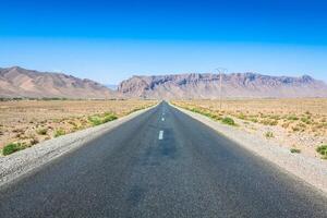 Desert road in Morocco photo