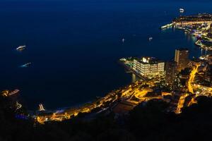 Monte Carlo in View of Monaco at night on the Cote d'Azur photo