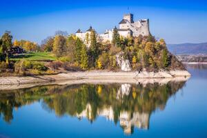 Castle on the lake in Niedzica, Poland photo