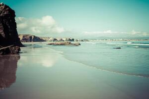 Las Catedrales beach in Galicia, Spain. Paradise beach in Ribadeo, Spain photo