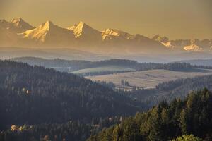 Tatra mountains in rural scene, Poland photo