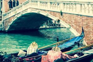 Gondolas in canal -symbol of Venice ,Italy photo