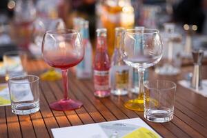 empty clean glass for alcoholic drinks in the restaurant on the table photo