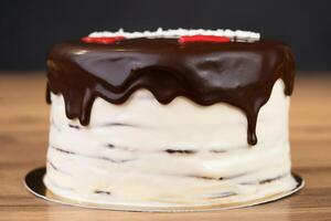 delicious fresh sweet chocolate covered birthday cake photo