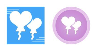 Heart shaped balloons Vector Icon