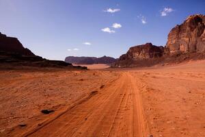 Wadi Rum Desert in Jordan. On the Sunset. Panorama of beautiful sand pattern on the dune. Desert landscape in Jordan. photo