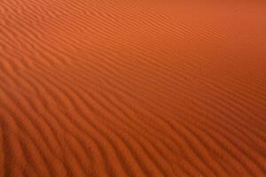 Wadi Rum Desert in Jordan. On the Sunset. Panorama of beautiful sand pattern on the dune. Desert landscape in Jordan. photo