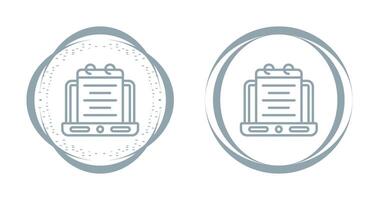 Laptop with notepad Vector Icon