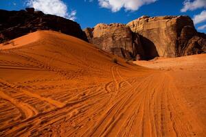 Wadi Rum Desert in Jordan. On the Sunset. Panorama of beautiful sand pattern on the dune. Desert landscape in Jordan. photo