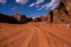 Wadi Rum Desert in Jordan. On the Sunset. Panorama of beautiful sand pattern on the dune. Desert landscape in Jordan. photo