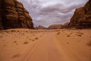 Wadi Rum Desert in Jordan. On the Sunset. Panorama of beautiful sand pattern on the dune. Desert landscape in Jordan. photo