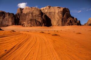 Wadi Rum Desert in Jordan. On the Sunset. Panorama of beautiful sand pattern on the dune. Desert landscape in Jordan. photo