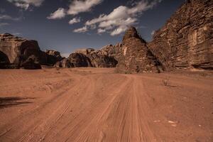 Wadi Rum Desert in Jordan. On the Sunset. Panorama of beautiful sand pattern on the dune. Desert landscape in Jordan. photo