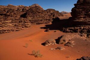 Wadi Rum Desert in Jordan. On the Sunset. Panorama of beautiful sand pattern on the dune. Desert landscape in Jordan. photo