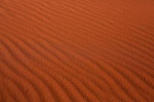 Wadi Rum Desert in Jordan. On the Sunset. Panorama of beautiful sand pattern on the dune. Desert landscape in Jordan. photo